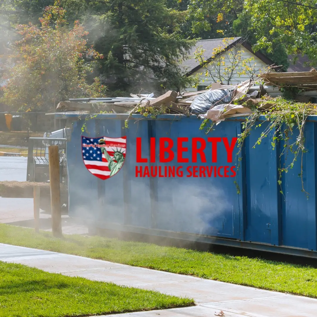 Man loading household junk into a rented dumpster for a one-day cleanup